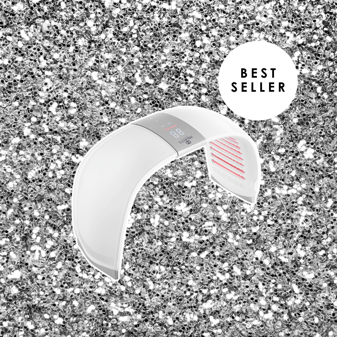 A Project E Beauty "Best Seller" LED tunnel for red light therapy, displayed on a festive silver glitter background